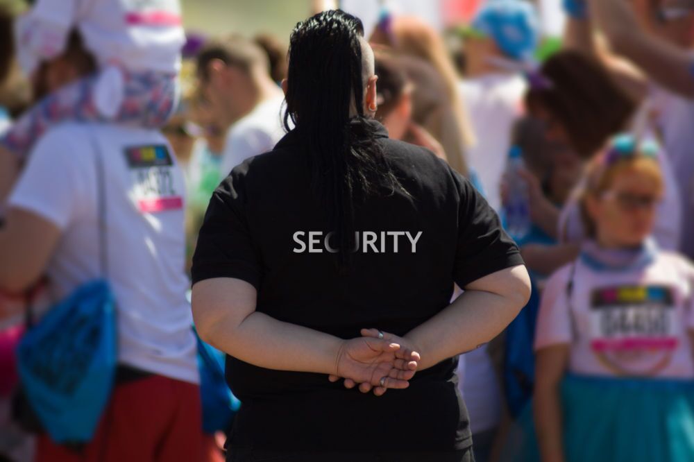 Amtivo (Formerly Certification Europe and EQA) - Door Supervisor Certificate - Member of security guard team monitoring a public event.