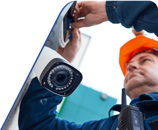 Amtivo (Formerly Certification Europe and EQA) - CCTV Certification - Worker with a hardhat installing a CCTV system